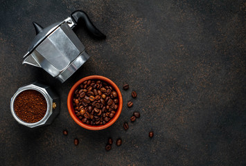 Geyser Coffee Maker and beans on a stone background. Top view with copy space for your text.