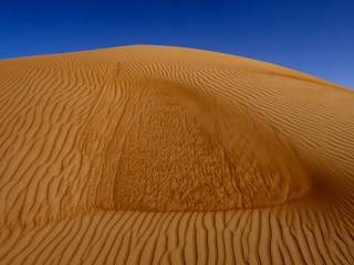 The wind makes the sand of the Omani desert a beautiful formation, Oman