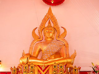 Beautiful golden buddha statue in temple, peaceful place,travel asia Thailand.