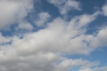 Fototapeta na wymiar Blue sky with clouds 4, in April 2020.