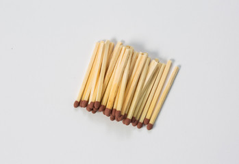 Close-up of a red match isolated on a white.