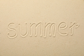 Inscription Summer on sea sand, top view