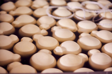 Scamorza cheese balls floating in water