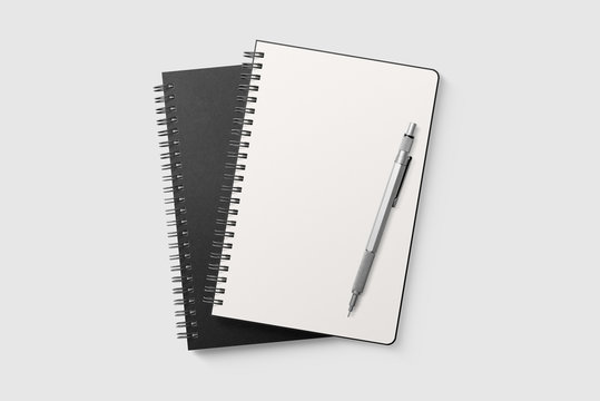 Real photo, spiral bound notepad mockup template with black paper cover, isolated on light grey background. High resolution.