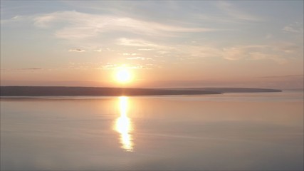 Panoramic shot of forest lake at sunset. Beautiful dawn shot on a lake in Russia