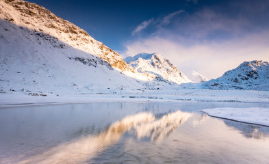 Haukland beach reflections