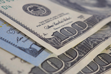 US money banknotes of 100 dollars old and new type close-up. American economy, inflation and devaluation. National currency. Macro