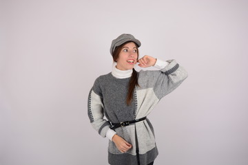 stylish woman in cap studio fashion style