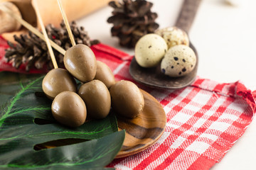 Quail egg satay is satay derived from quail eggs which are seasoned and skewed commonly served as a side dish for soto and chicken porridge 