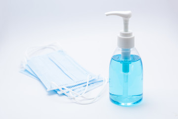 Hand sanitizer for protection Covid-19 virus And medical surgical masks for protection Covid-19 virus.Corona virus protection concept.