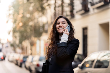 Young caucasian woman on the phone