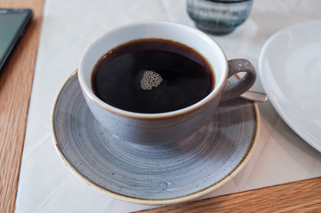 cup of coffee on a table