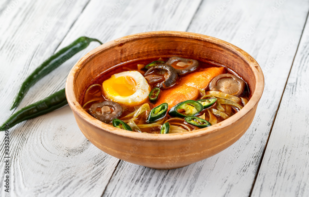 Sticker bowl of ramen with salmon