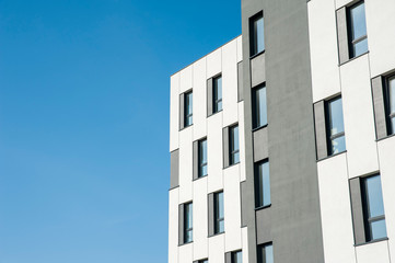 White and grey facade of modern office building