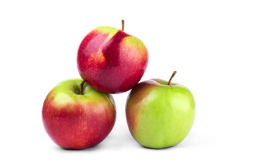 Three red green apples on a white isolated background