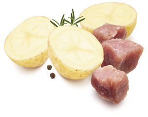 Ingredients for stew. Dices of meat, potatoes, black pepper and rosemary. Isolated on white background.