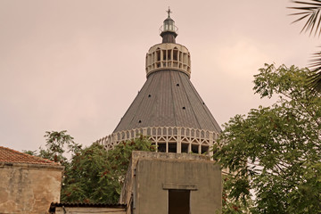 Fototapeta premium The dome of the Basilica of the Annunciation, Church of the Annunciation in Nazareth, Israel. Vintage filter
