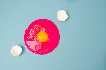 white broken egg on the table on white background