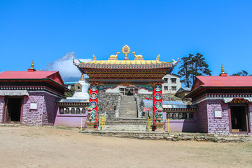 Tengboche Monastery (or Thyangboche Monastery), also known as Dawa Choling Gompa. View of entrance to the tibetan buddhist monastery of the Sherpa community. - obrazy, fototapety, plakaty