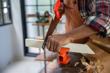 old carpenter man working from home, wood worker concept