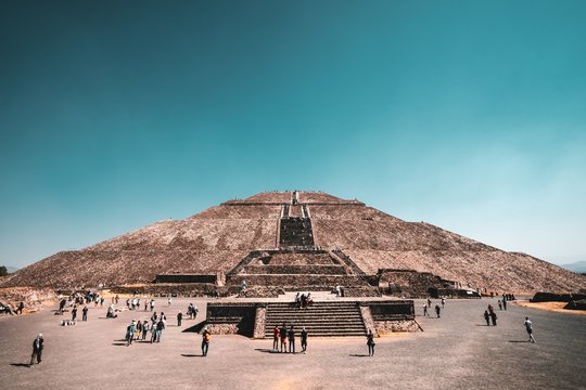 Low angle shot of The Pyramid of the Sun in Teotihuacan, Mexico with a clear sky in the background