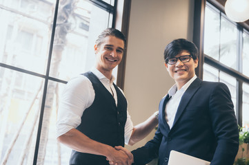 A group of business people celebrating the joy of business success