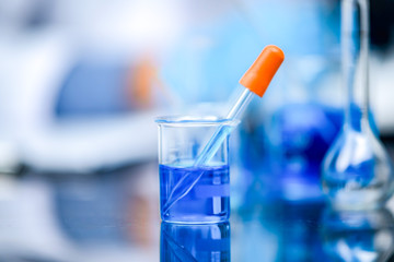 The researchers are working in a chemical laboratory.