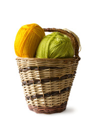 Photo illustration on knitting and needlework. The image is isolated on a white background. Yarn, knitting needles.