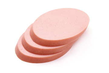 Fresh boiled pork sausage slices, isolated on white background