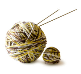 Photo illustration on knitting and needlework. The image is isolated on a white background. Yarn, knitting needles.