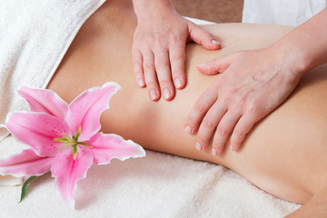 Obraz na płótnie Canvas Massage and body care. Spa body massage woman hands treatment.