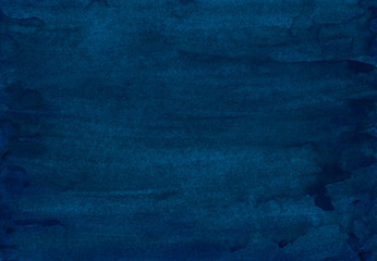 Watercolor dark indigo blue background painting. Vintage deep blue color hand painted watercolour backdrop. Stains on paper texture.