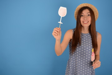 woman in hat with accessories for the holiday