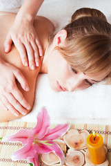 Obraz na płótnie Canvas Massage and body care. Spa body massage woman hands treatment. Woman having massage in the spa salon