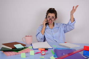 woman in glasses works in a business office