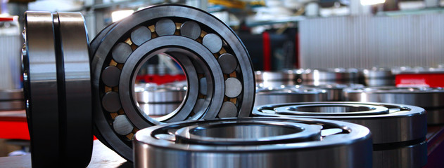 Steel bearings in production. Long banner. Finished goods. Concept of heavy industry.