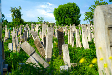 The Old Jewish cemetery at colorful sunset sky, Chernivtsi Ukraine.