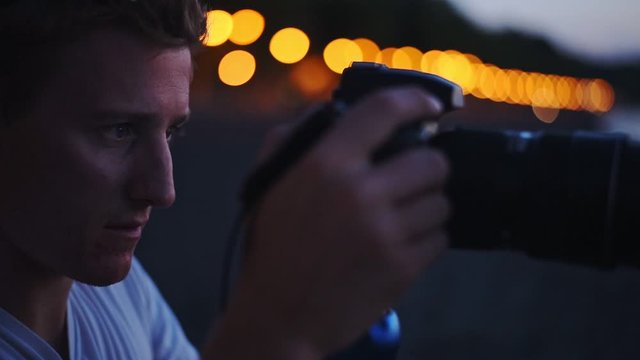 A Young Man Focusing Its Camera To Its Beautiful Subject In Italy At Night - Wide Shot