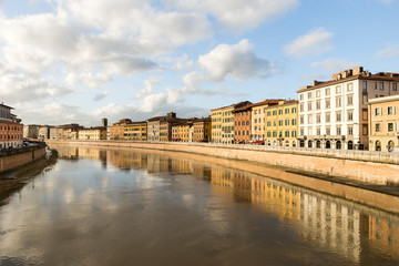 Fototapeta na wymiar Sights of Arno River from Ponte di Mezzo Bridge in Pisa, Tuscany Region, Italy.