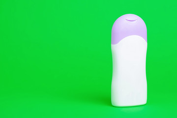 bottle shampoo gel shower beauty on green background