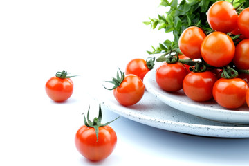 small cherry tomatoes on a white background