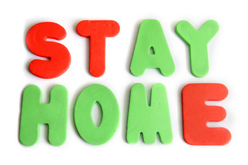 the call to stay at home is made up of colorful letters