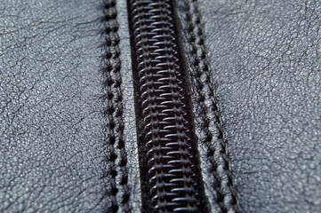 Lightning on a black leather texture.