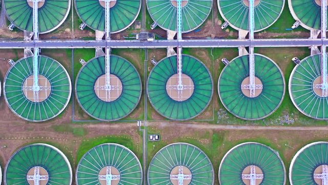 4k, Aerial footage Water treatment solution, Industrial water treatment&lrm;, Aerial top view recirculation solid contact clarifier sedimentation tank, Ecosystem and healthy environment concept.