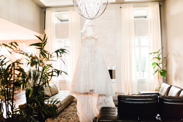 wedding dress on a hanger