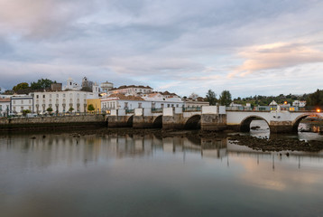 Obraz premium Tavira city view with river gilao in Algarve at sunset, Portugal