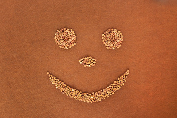 buckwheat smile on brown background face joke,funny face