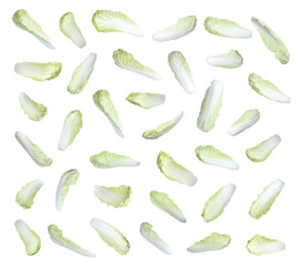Set with fresh leaves of napa cabbage on white background