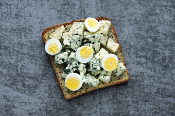 Keto toasts with blue cheese and egg. Healthy breakfast or snack. Keto diet.