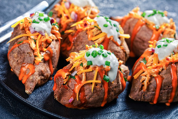 Close-up sweet potato skins with shredded chicken